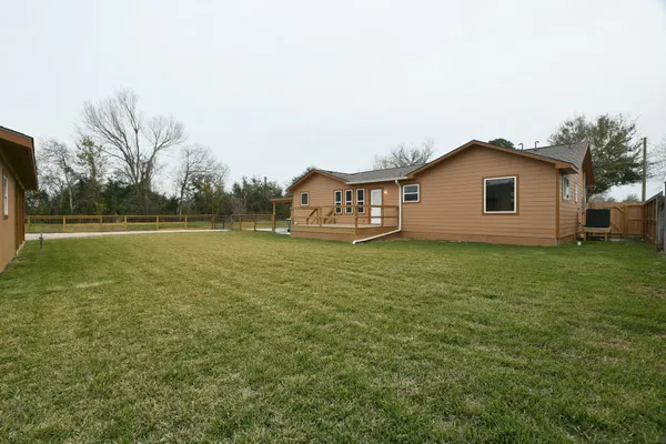 a house view with a garden space