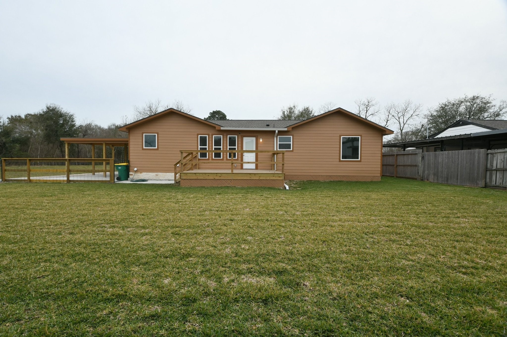 3200 Hoover Street La Marque, TX 77568 - Photo 30 of 31 a view of a house with a yard and a fountain
