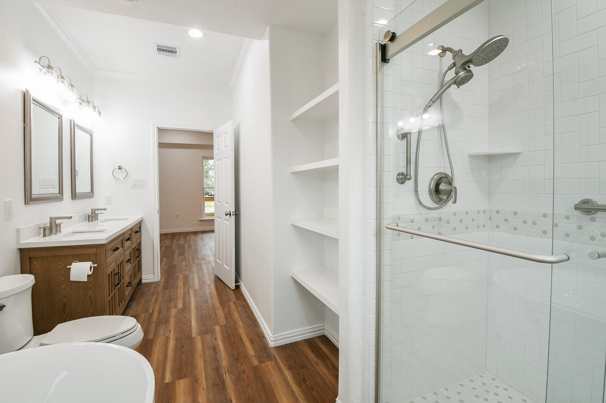 3200 Hoover Street La Marque, TX 77568 - Photo 10 of 31 a bathroom with a sink a toilet and shower