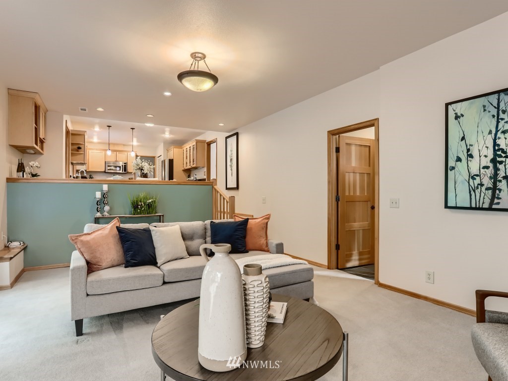 23630 3rd Place West Bothell, WA 98021 - Photo 16 of 28 a living room with furniture and a rug