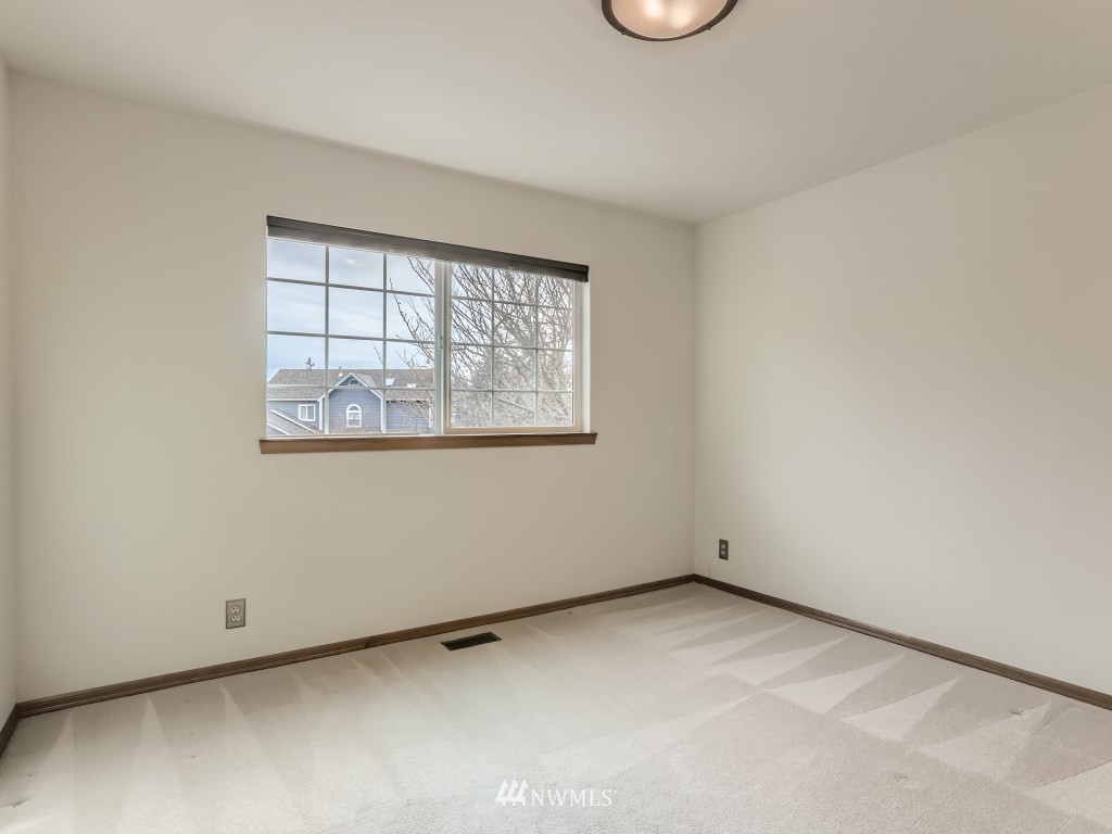 23630 3rd Place West Bothell, WA 98021 - Photo 22 of 28 an empty room with a window