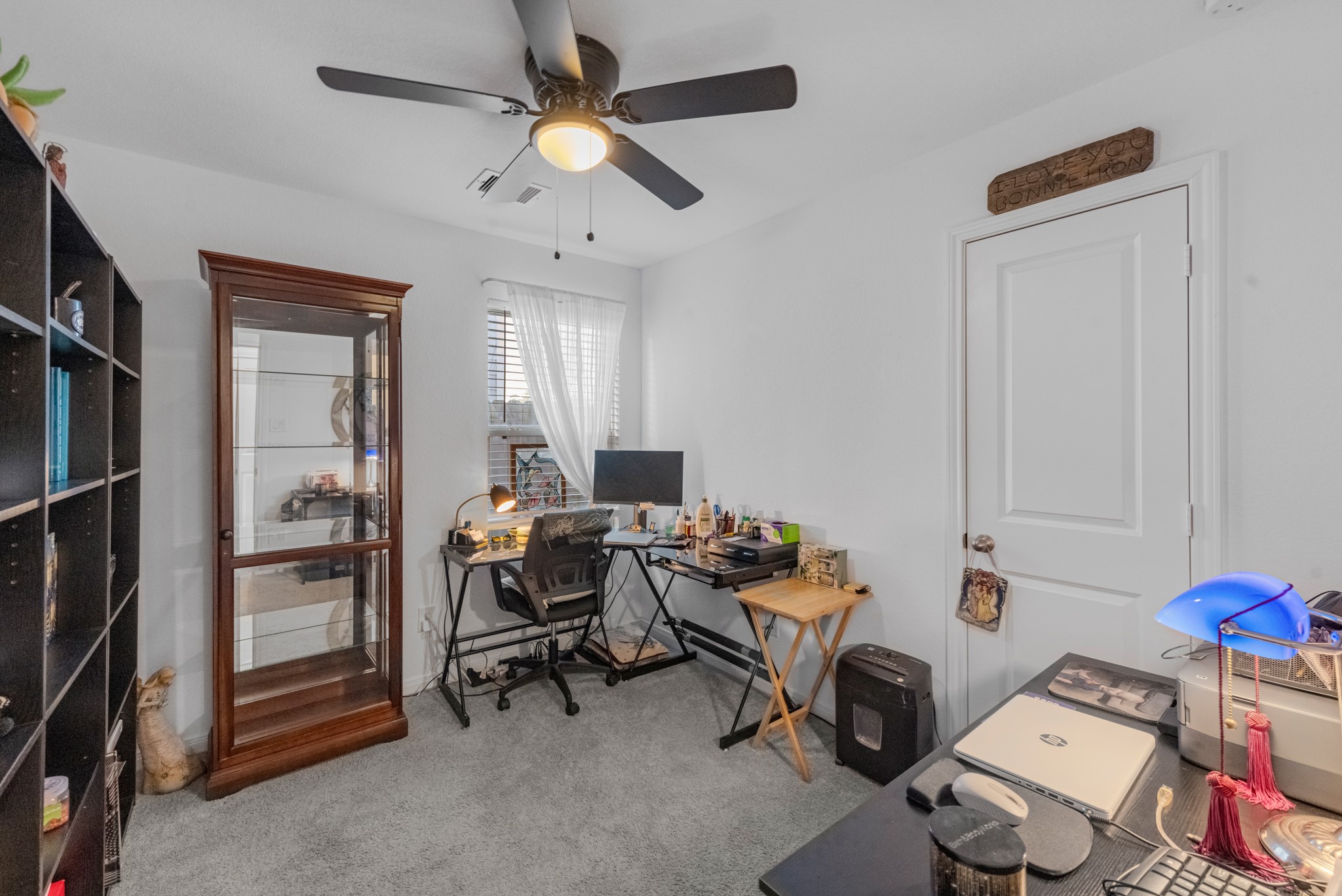 16511 Colleen Place Conroe, TX 77306 - Photo 15 of 17 a view of a workspace with furniture