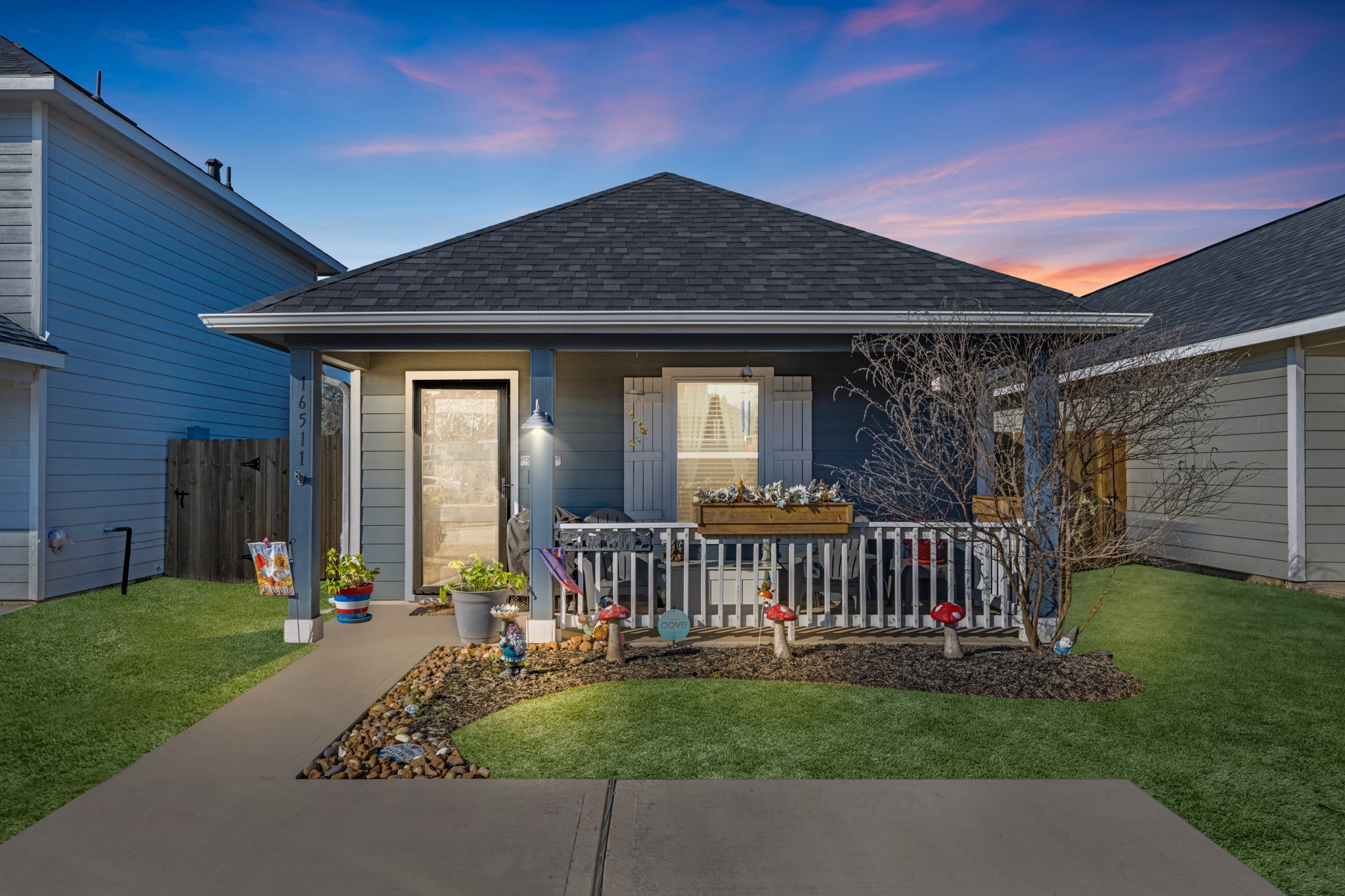 16511 Colleen Place Conroe, TX 77306 - Photo 2 of 17 a view of a house with backyard and porch