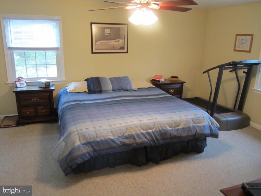 238 Hickory Drive Lititz, PA 17543 - Photo 14 of 27 a bedroom with a bed and a window