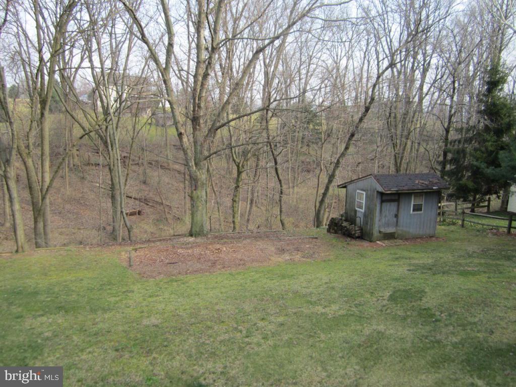 238 Hickory Drive Lititz, PA 17543 - Photo 3 of 27 a backyard of a house with lots of green space