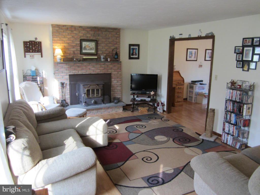 238 Hickory Drive Lititz, PA 17543 - Photo 6 of 27 a living room with furniture and a fireplace