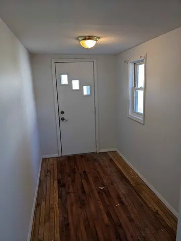 a view of an empty room and window