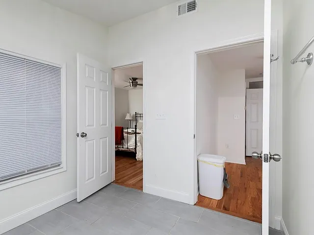 a view of a room with a hallway