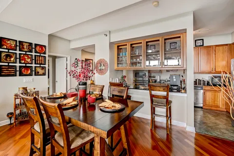 a kitchen with stainless steel appliances a stove a sink and a microwave