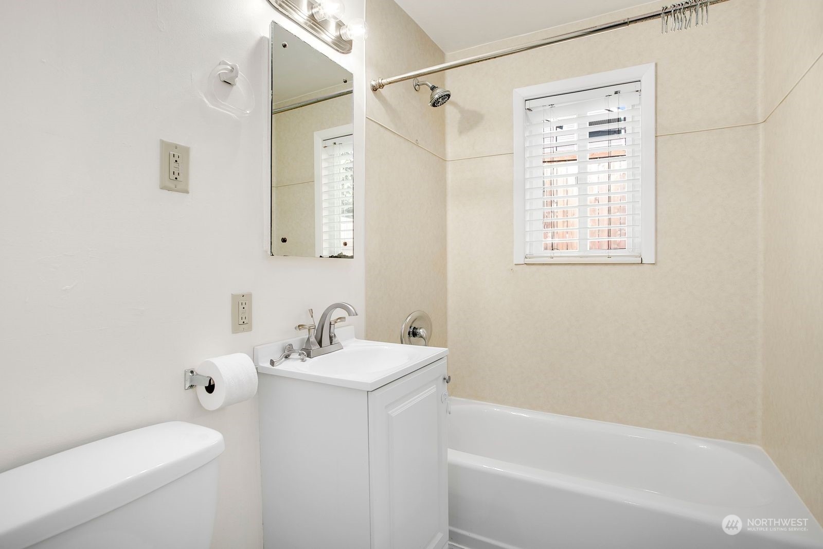 3702 Southwest Holden Street Seattle, WA 98126 - Photo 14 of 23 a bathroom with a sink a toilet and shower