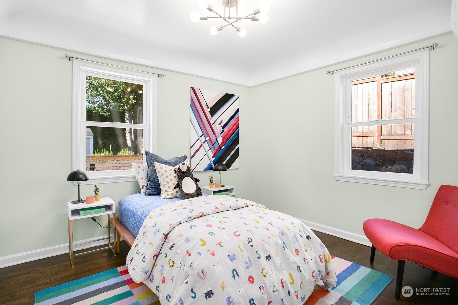 3702 Southwest Holden Street Seattle, WA 98126 - Photo 15 of 23 a bedroom with a bed and a window