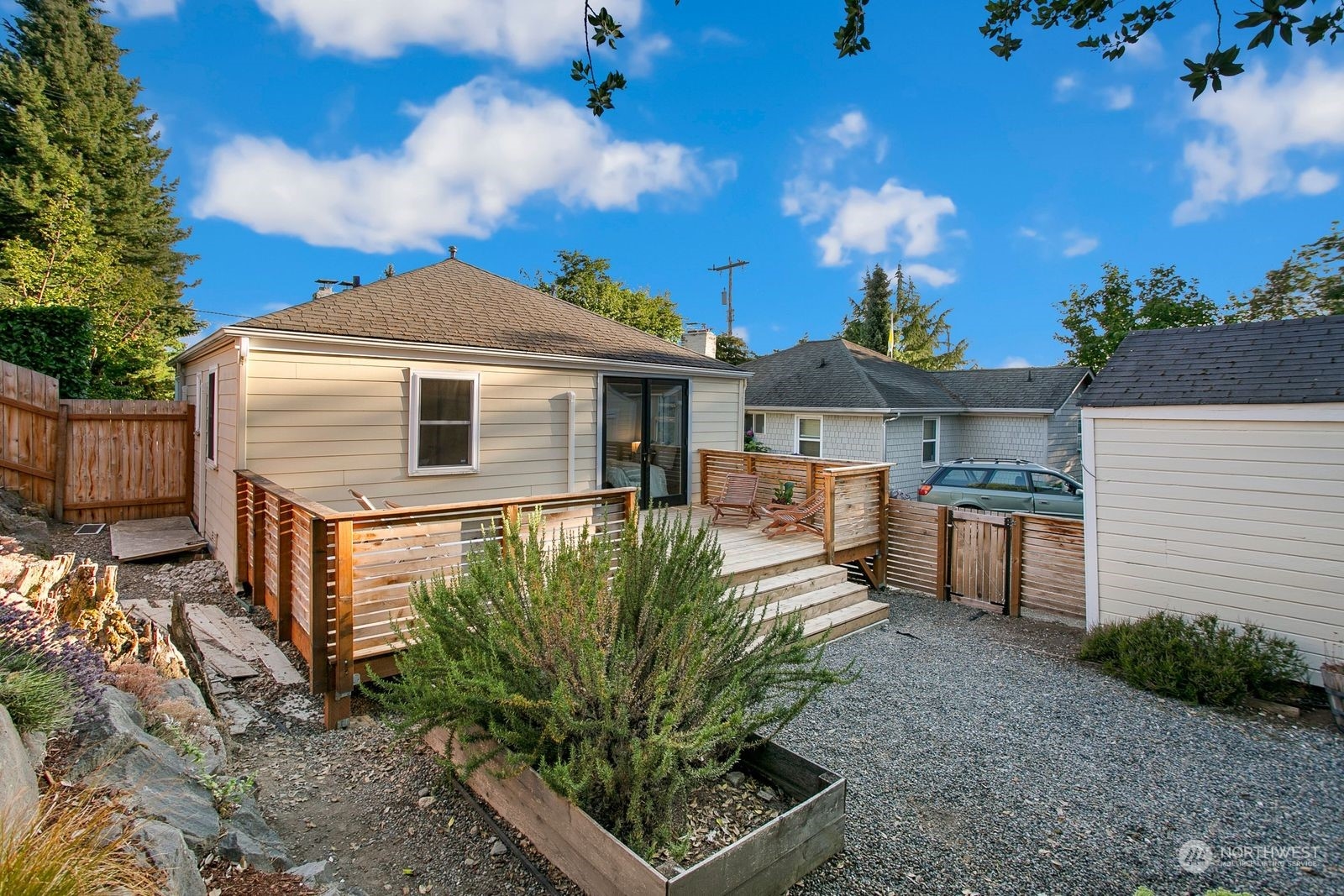 3702 Southwest Holden Street Seattle, WA 98126 - Photo 19 of 23 a front view of a house with a yard