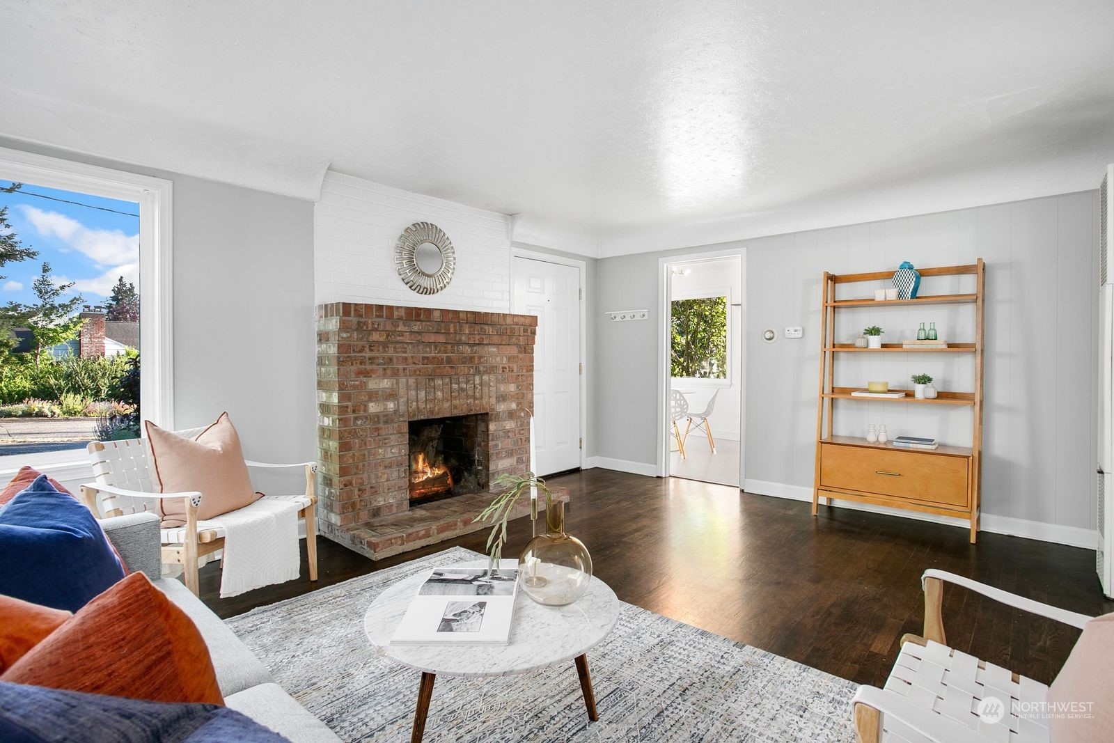 3702 Southwest Holden Street Seattle, WA 98126 - Photo 4 of 23 a living room with furniture and a fireplace