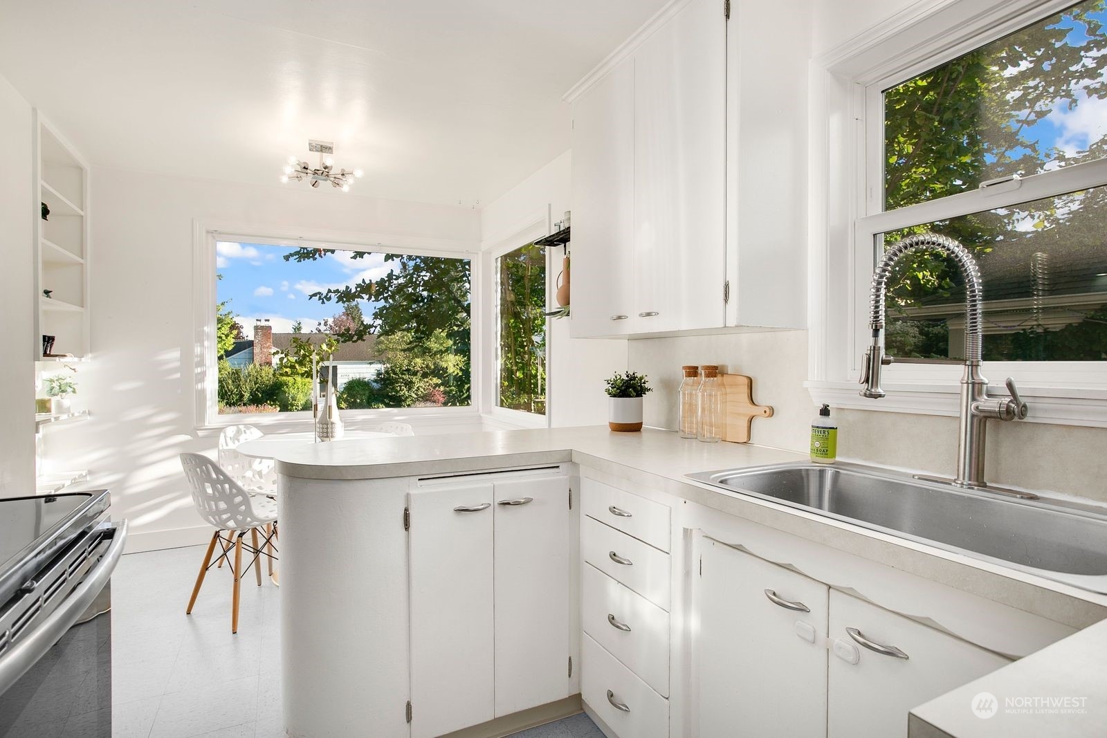 3702 Southwest Holden Street Seattle, WA 98126 - Photo 8 of 23 a kitchen with a sink and cabinets