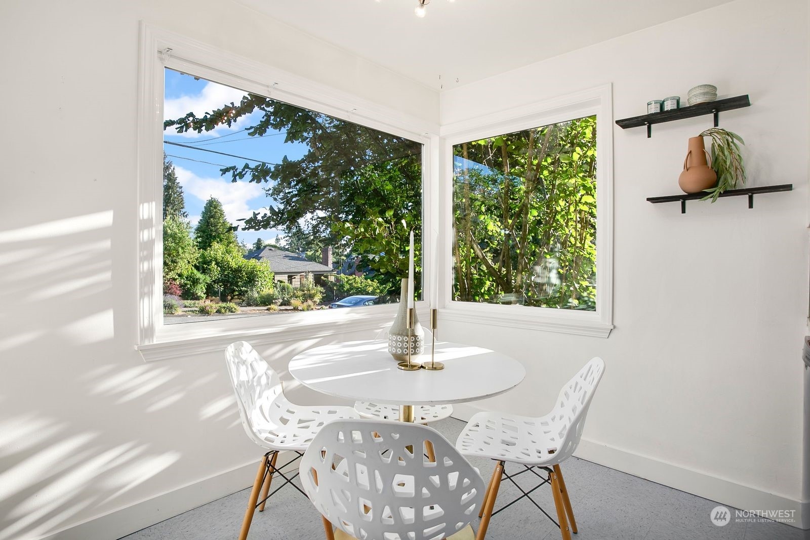 3702 Southwest Holden Street Seattle, WA 98126 - Photo 10 of 23 a view of a dining room with furniture window and outside view