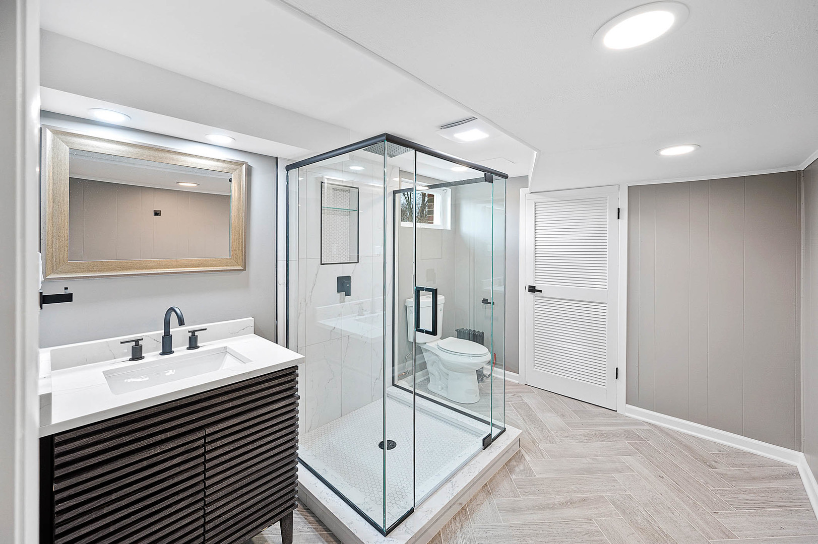 520 Dodson Street Geneva, IL 60134 - Photo 17 of 21 a bathroom with a sink a mirror and a shower