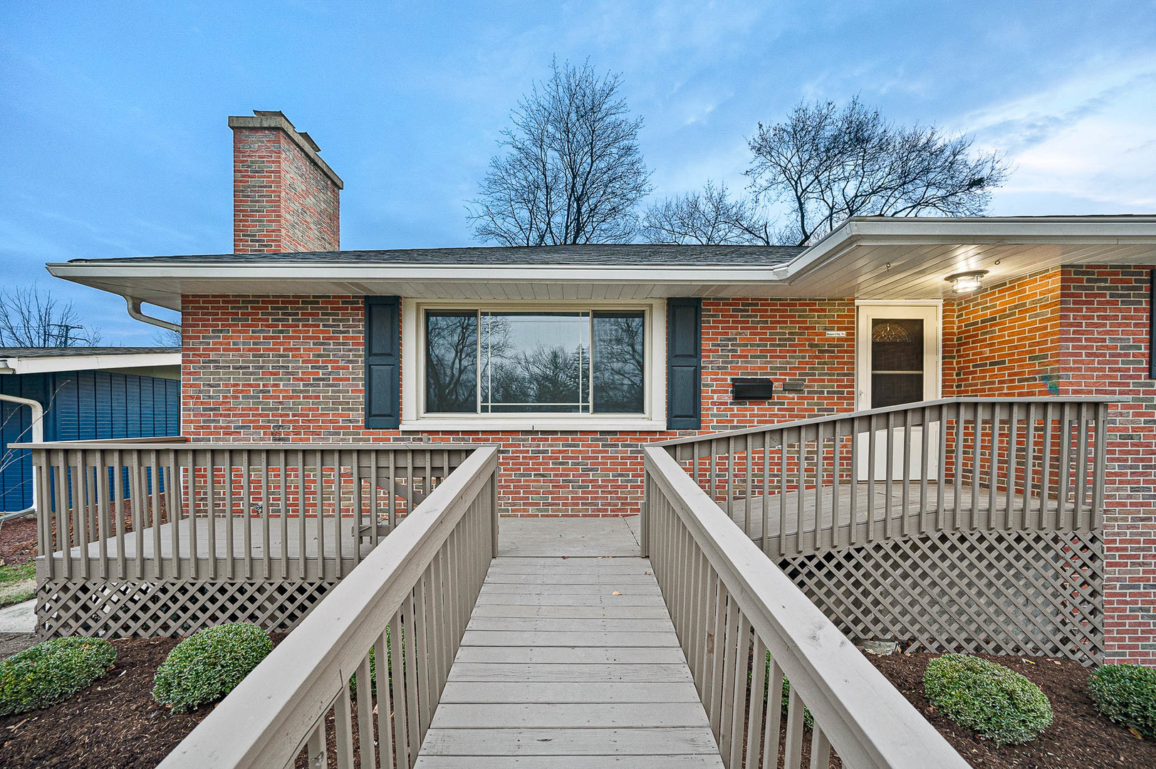 520 Dodson Street Geneva, IL 60134 - Photo 2 of 21 a view of a brick house with large windows