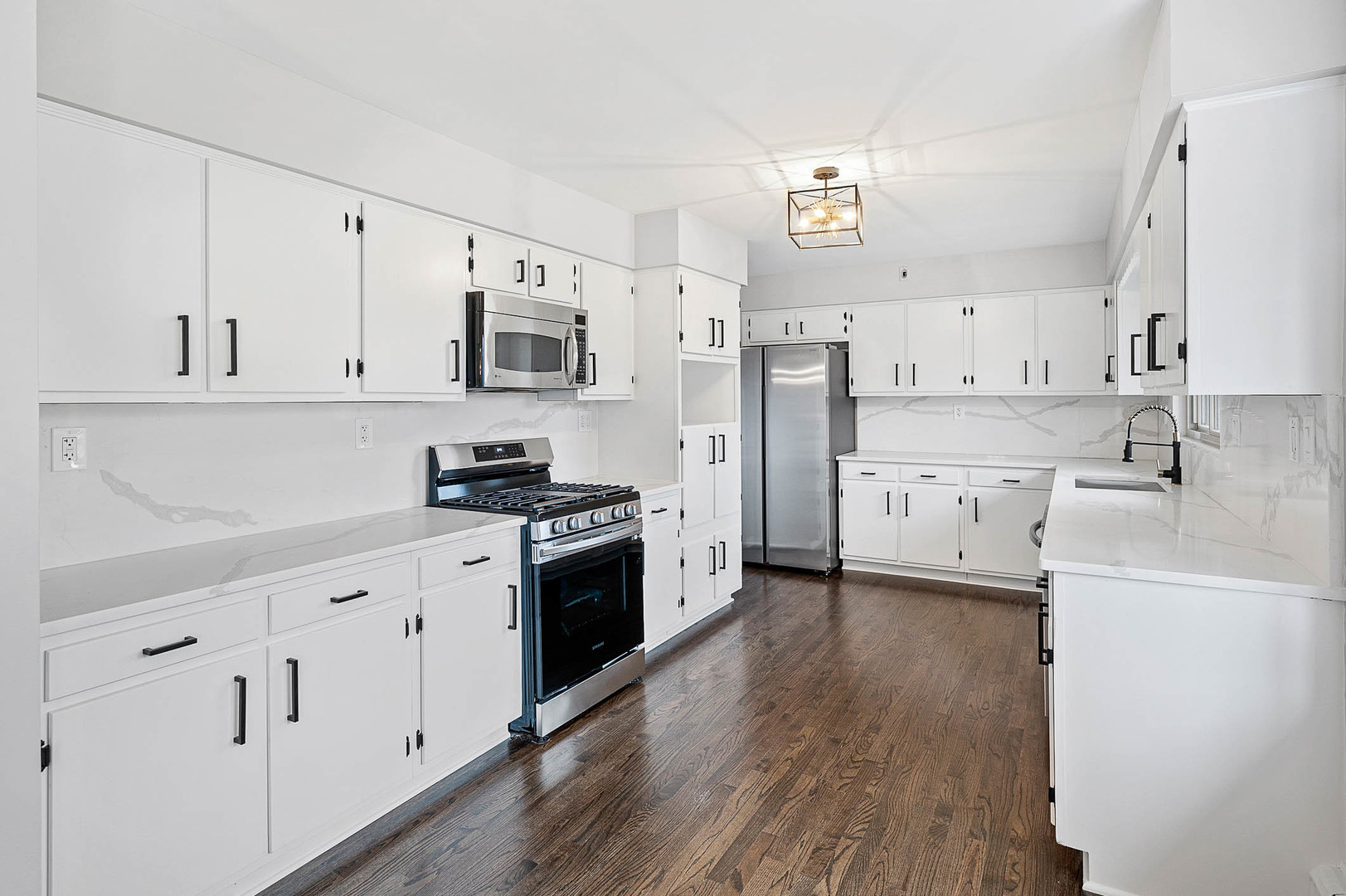 520 Dodson Street Geneva, IL 60134 - Photo 7 of 21 a kitchen with stainless steel appliances a stove a sink and a refrigerator