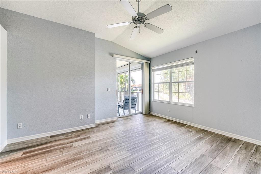 10751 Crooked River Road, Unit 202 Estero, FL 34135 - Photo 12 of 45 Sliding door to lanai