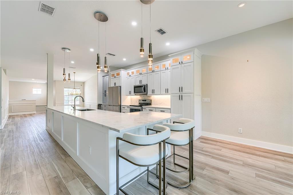 10751 Crooked River Road, Unit 202 Estero, FL 34135 - Photo 9 of 45 STUNNING PENDANT LIGHTING