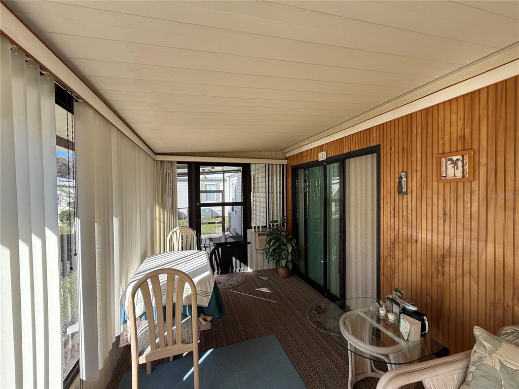 105 Cypress Road Wildwood, FL 34785 - Photo 23 of 26 a view of a livingroom with furniture and windows