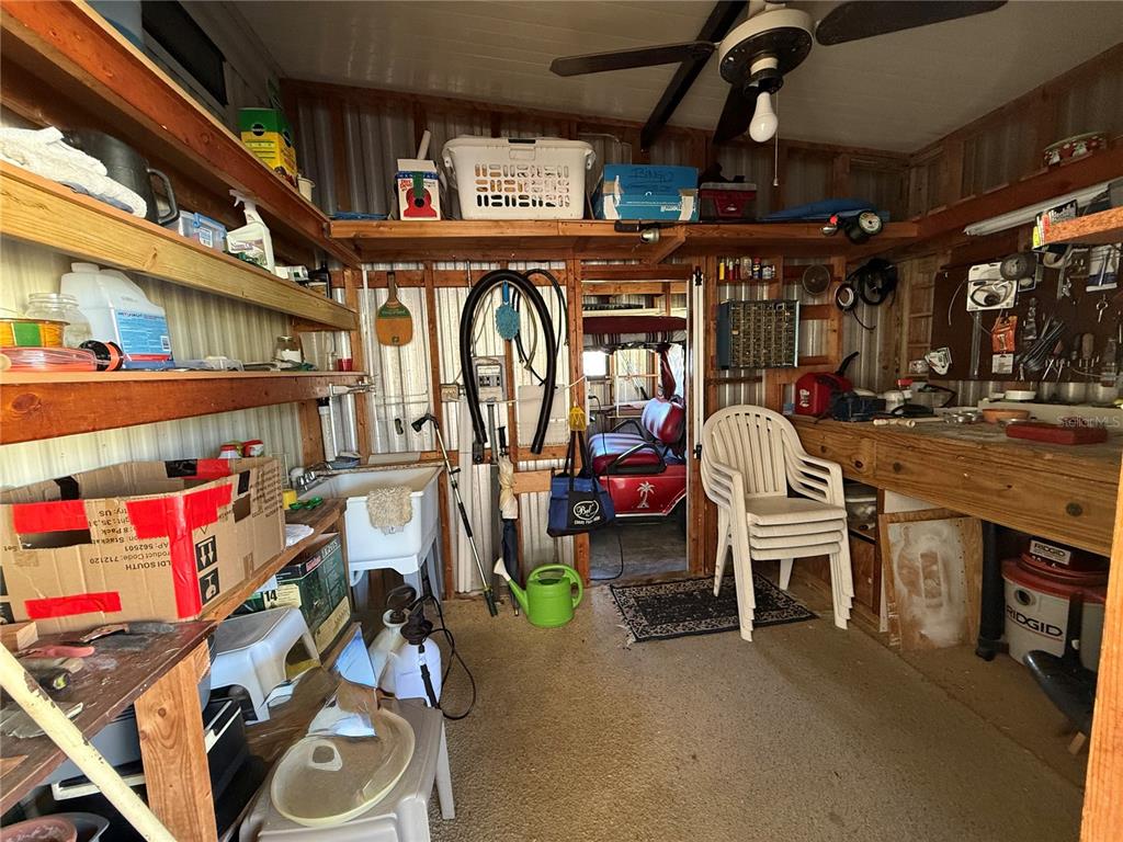 105 Cypress Road Wildwood, FL 34785 - Photo 25 of 26 a view of storage and utility room
