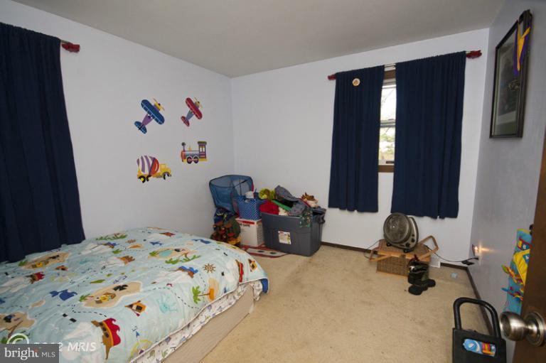 342 Old Joppa Road Fallston, MD 21047 - Photo 16 of 28 a bedroom with a bed and a window