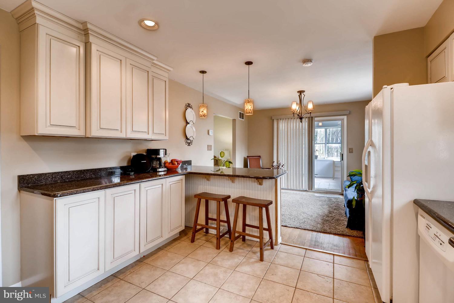 342 Old Joppa Road Fallston, MD 21047 - Photo 8 of 28 a kitchen with granite countertop a sink cabinets and stainless steel appliances