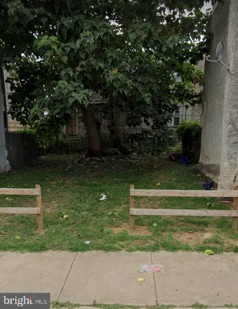 a view of garden with trees