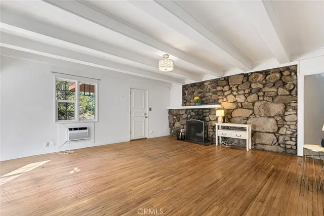 a view of a livingroom with furniture and chandelier