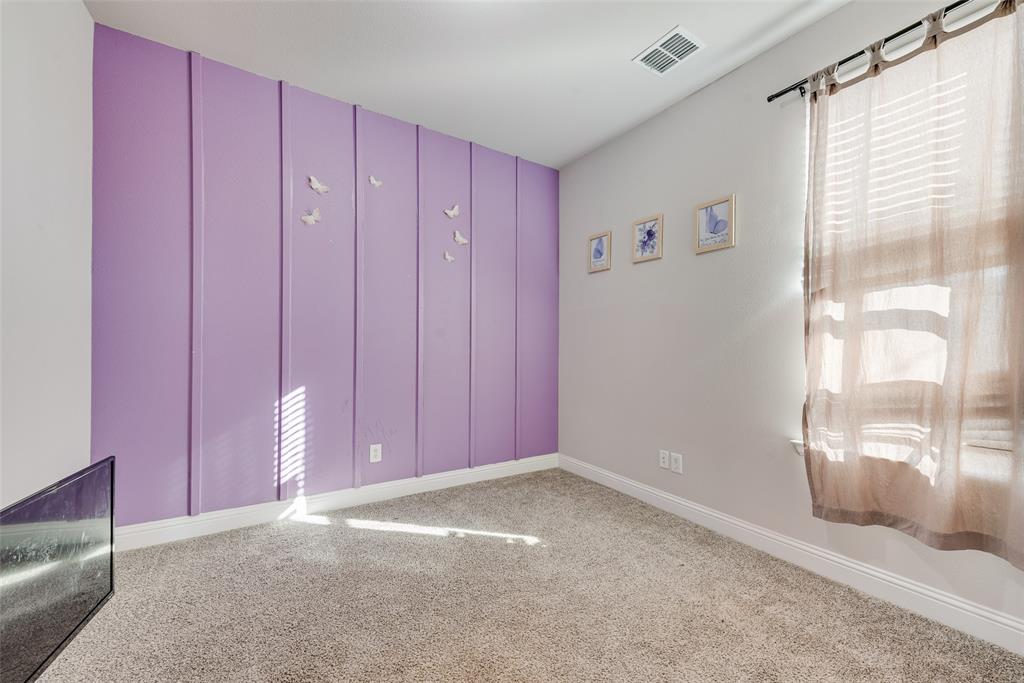 404 West Rochester Street Terrell, TX 75160 - Photo 18 of 24 a view of a livingroom with an empty space and a window