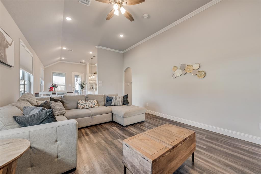 404 West Rochester Street Terrell, TX 75160 - Photo 21 of 24 a living room with furniture and a chandelier