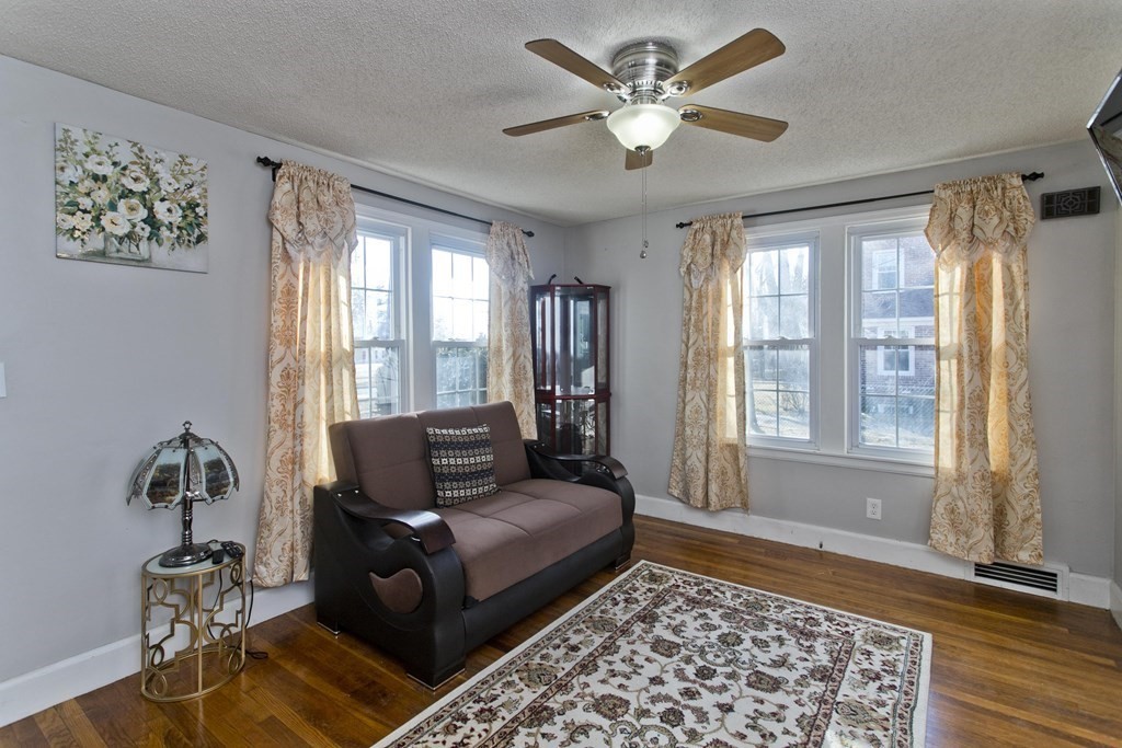 2020 Wilbraham Road Springfield, MA 01129 - Photo 11 of 37 a living room with furniture and a window