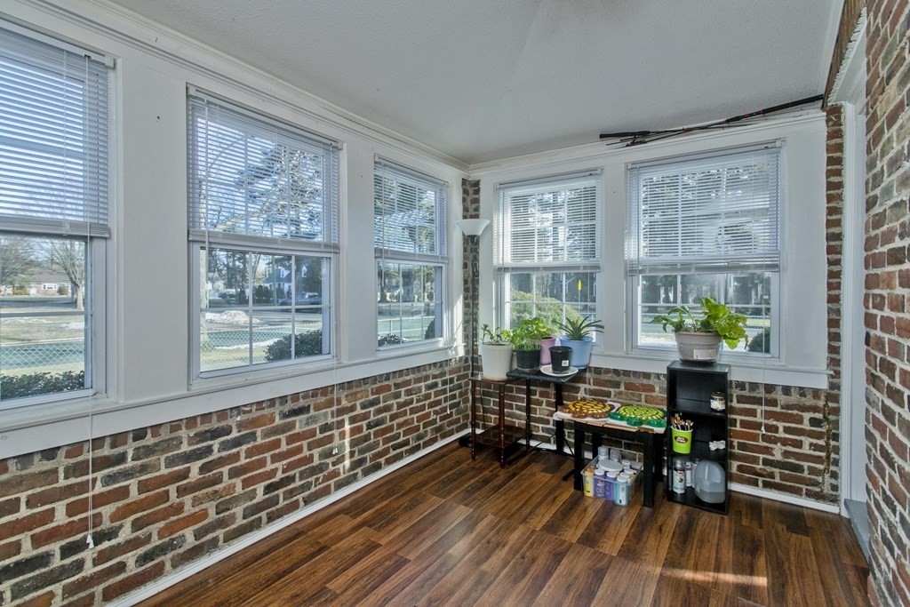 2020 Wilbraham Road Springfield, MA 01129 - Photo 15 of 37 a room with wooden floor and furniture