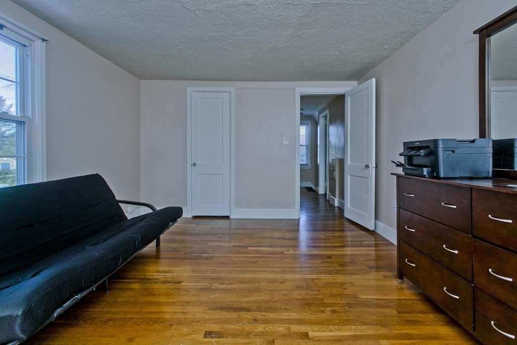 2020 Wilbraham Road Springfield, MA 01129 - Photo 24 of 37 a view of a room with wooden floor and lounge chair