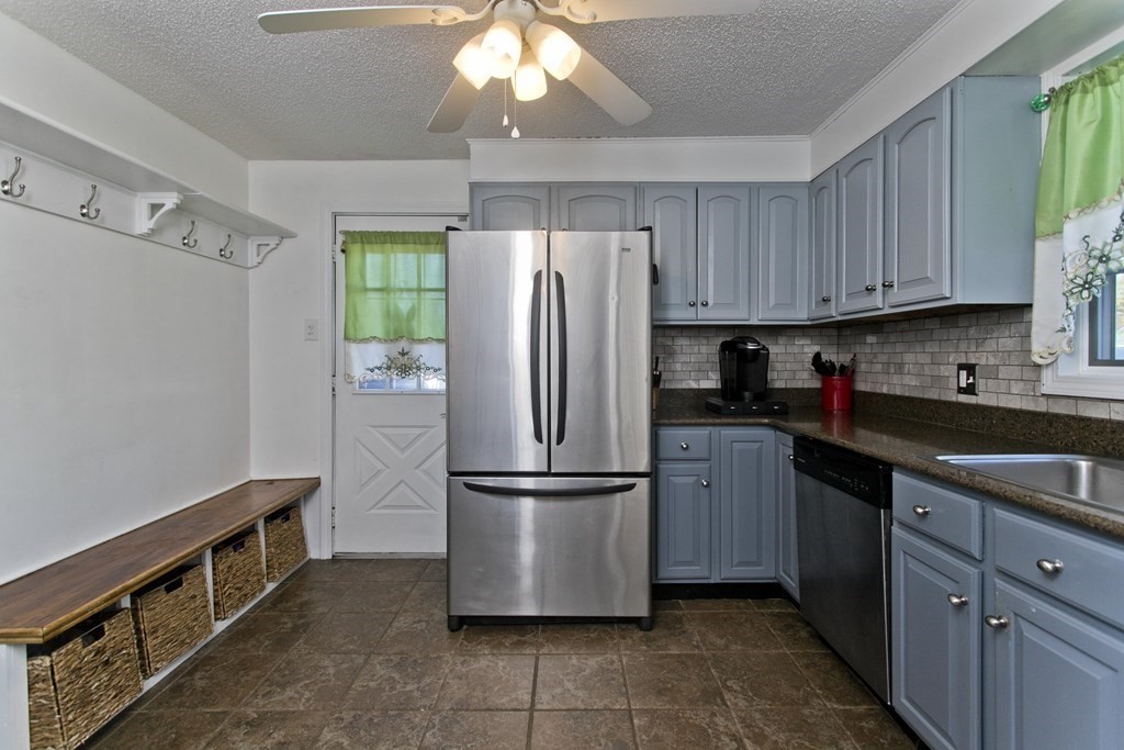2020 Wilbraham Road Springfield, MA 01129 - Photo 3 of 37 a kitchen with stainless steel appliances granite countertop a refrigerator a sink and dishwasher