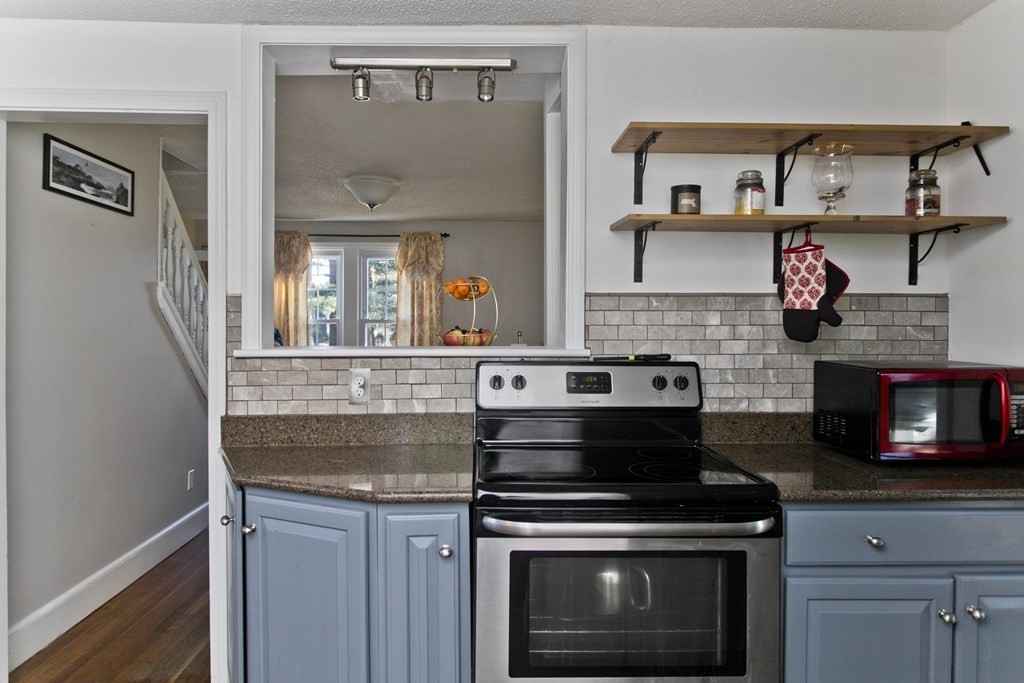 2020 Wilbraham Road Springfield, MA 01129 - Photo 8 of 37 a kitchen with stainless steel appliances granite countertop a stove and a sink