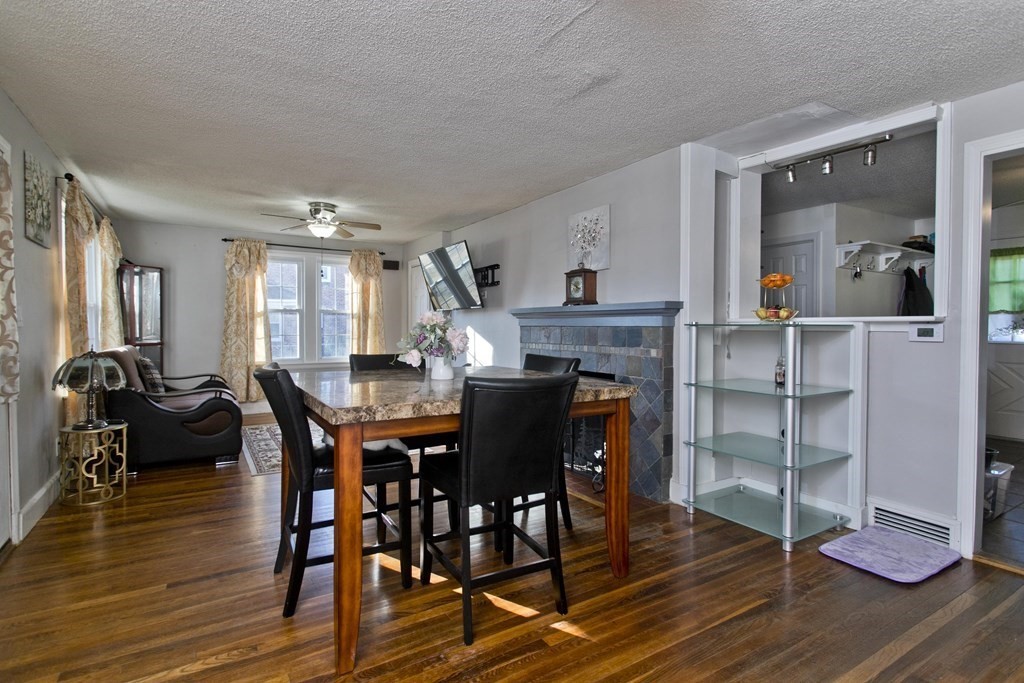 2020 Wilbraham Road Springfield, MA 01129 - Photo 9 of 37 a view of a dining room with furniture and wooden floor