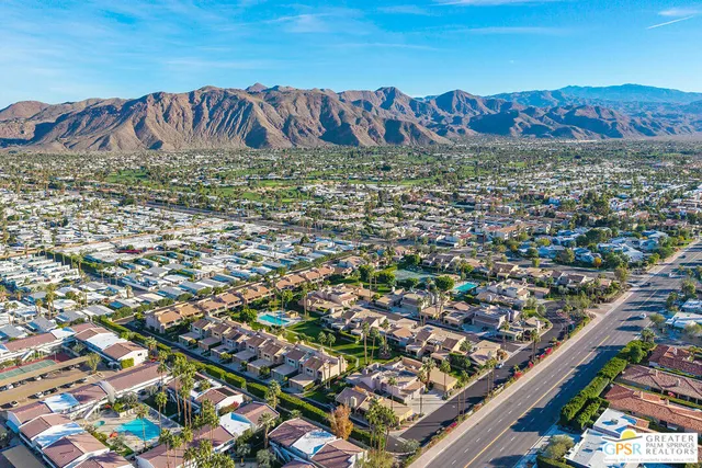 a view of a city with an ocean
