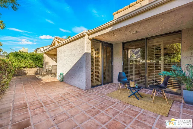 a view of outdoor seating area with furniture