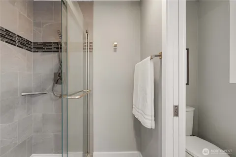 a bathroom with a sink double vanity and mirror