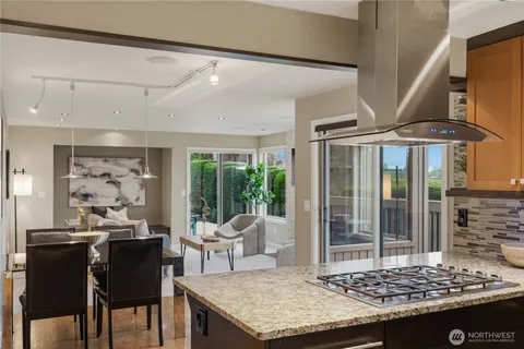 a kitchen with a sink and wooden cabinets