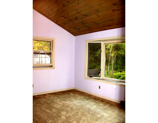 687 Townsend Road Groton, MA 01450 - Photo 13 of 17 a bathroom with a tub and a window