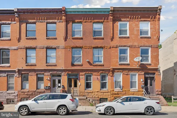 a car parked in front of a building