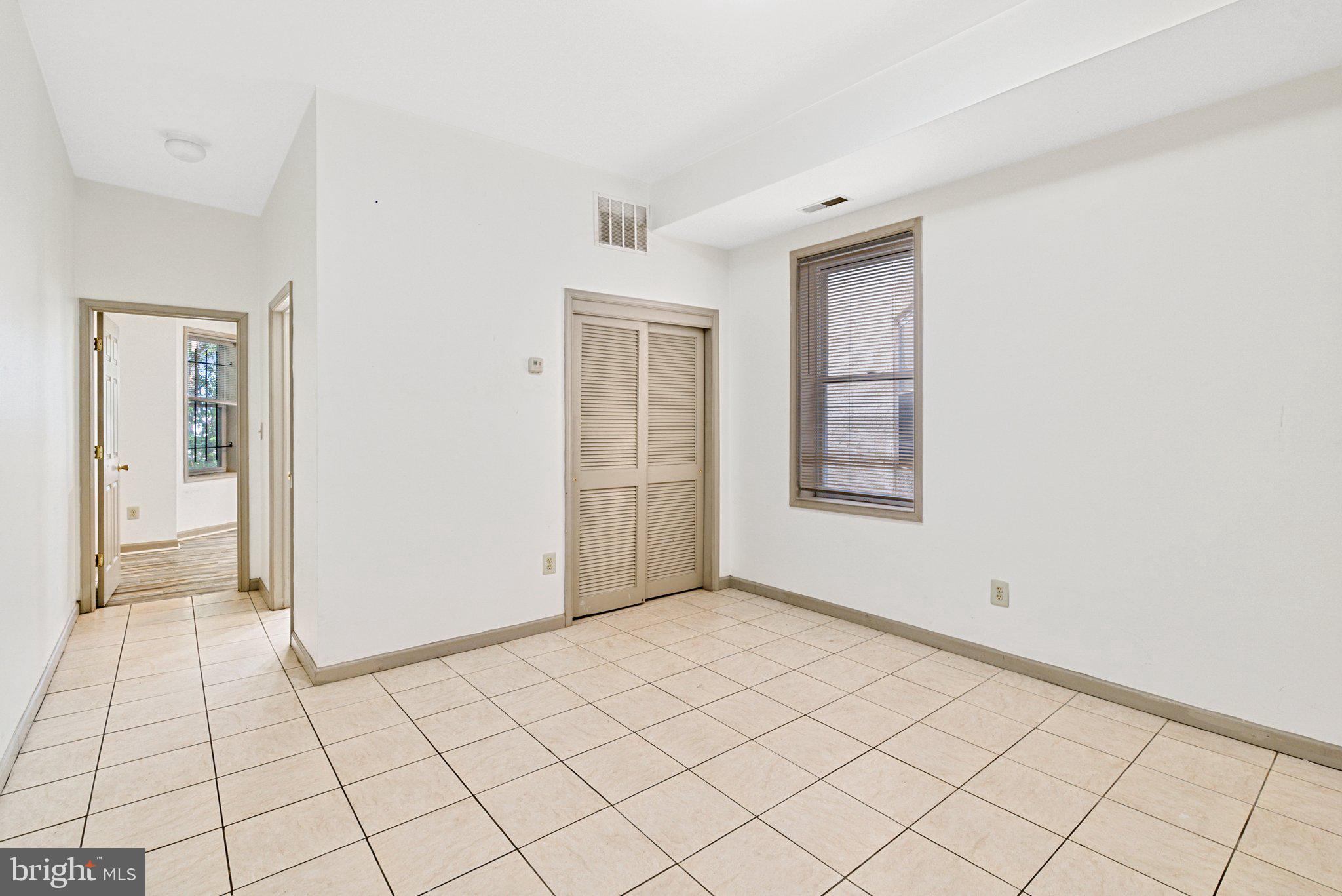 1621 West Diamond Street Philadelphia, PA 19121 - Photo 3 of 18 a view of an empty room and window