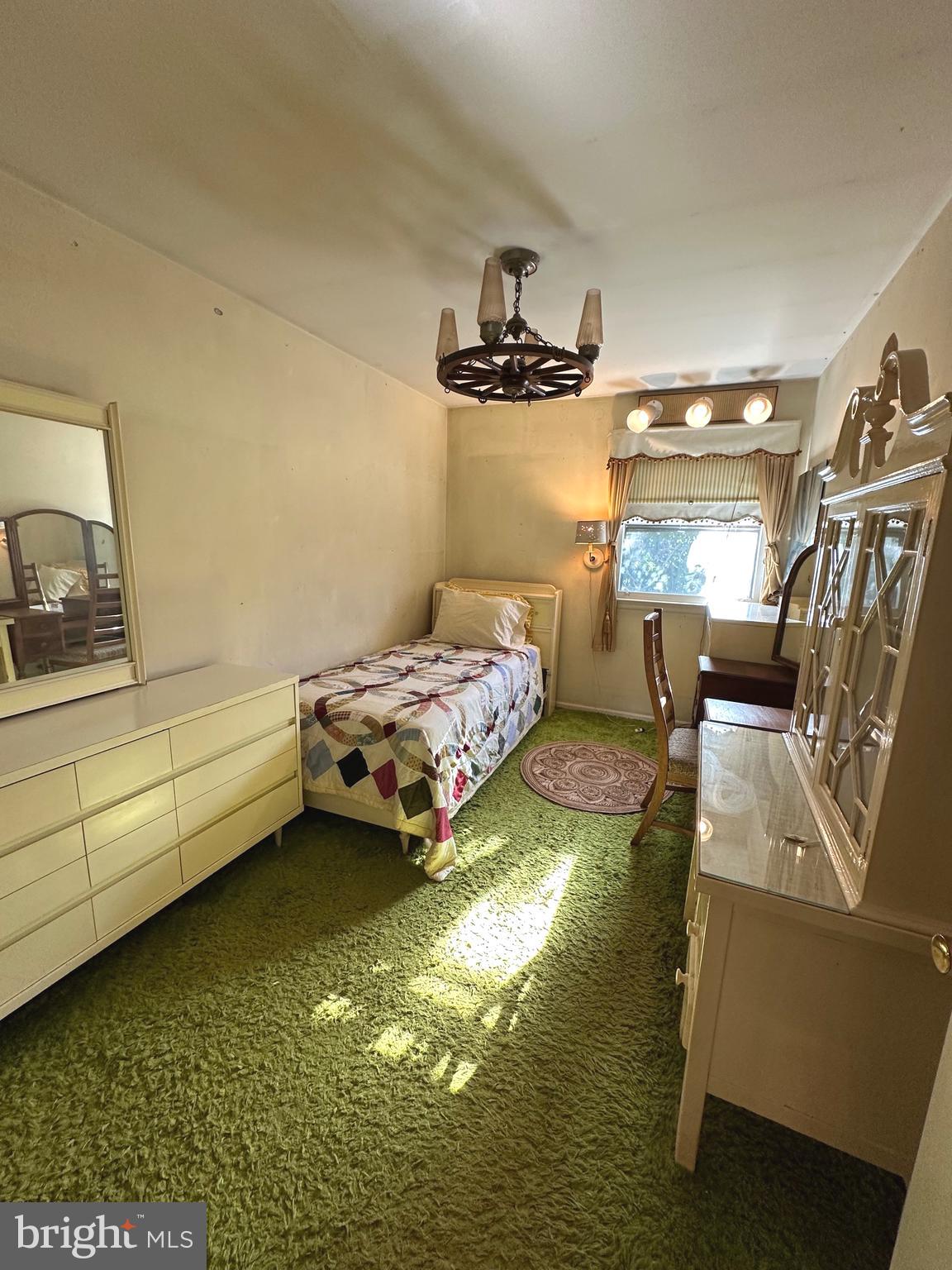 2740 Mower Street Philadelphia, PA 19152 - Photo 11 of 23 a bed room with a bed and a television