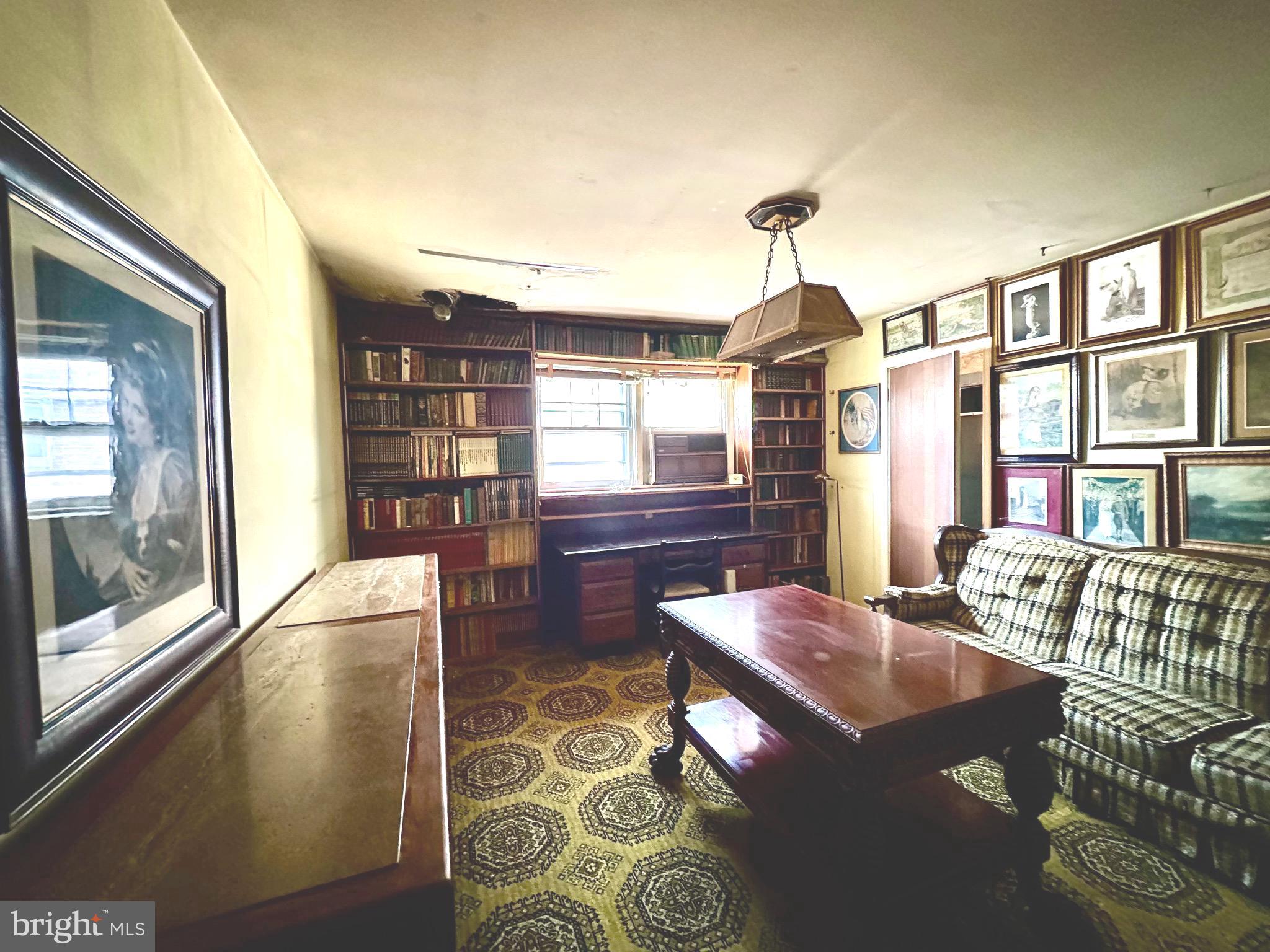2740 Mower Street Philadelphia, PA 19152 - Photo 14 of 23 a living room with furniture and a window