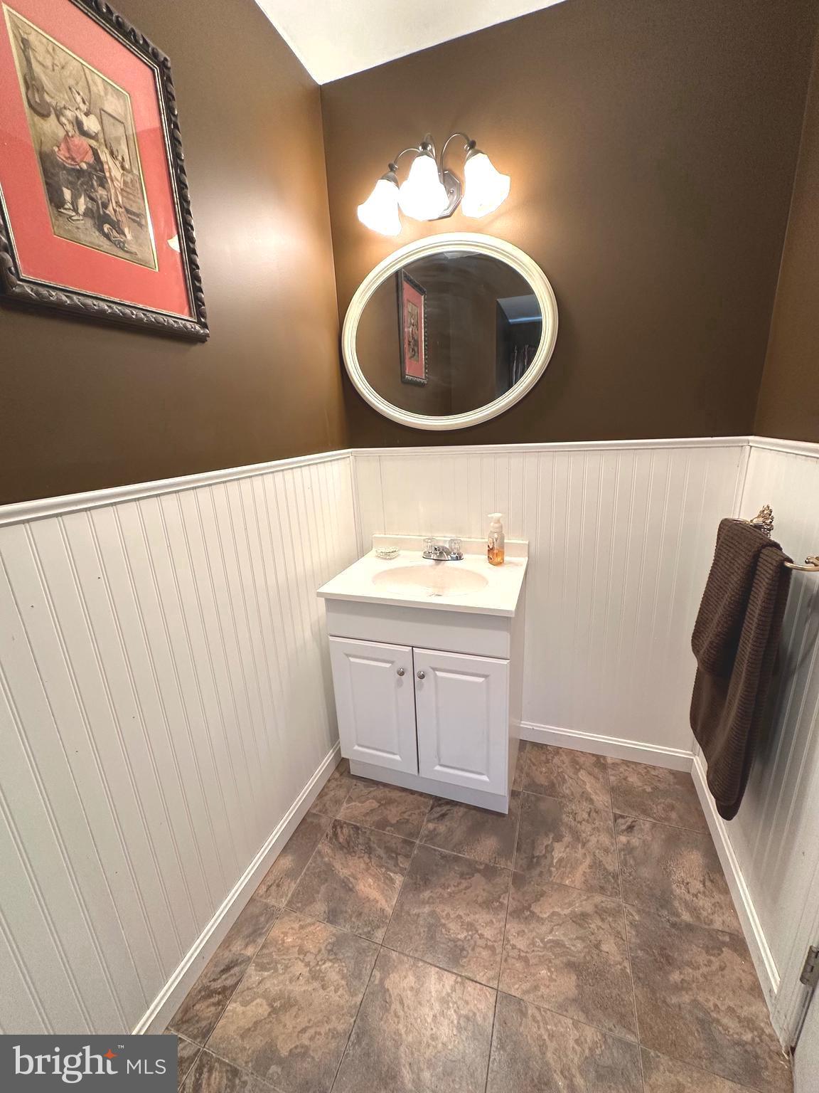 2740 Mower Street Philadelphia, PA 19152 - Photo 18 of 23 a bathroom with a sink and a mirror