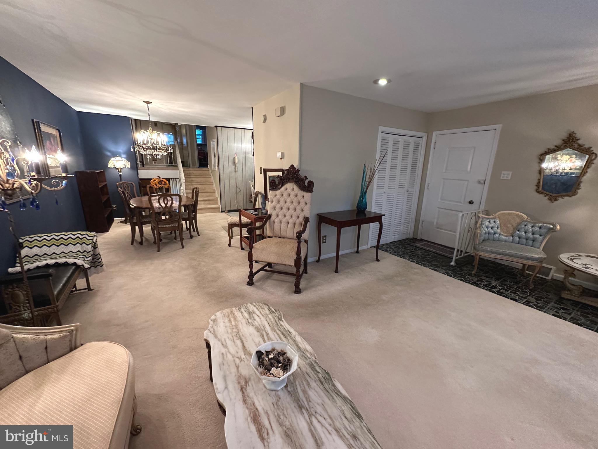 2740 Mower Street Philadelphia, PA 19152 - Photo 2 of 23 a living room with furniture and a gym machine