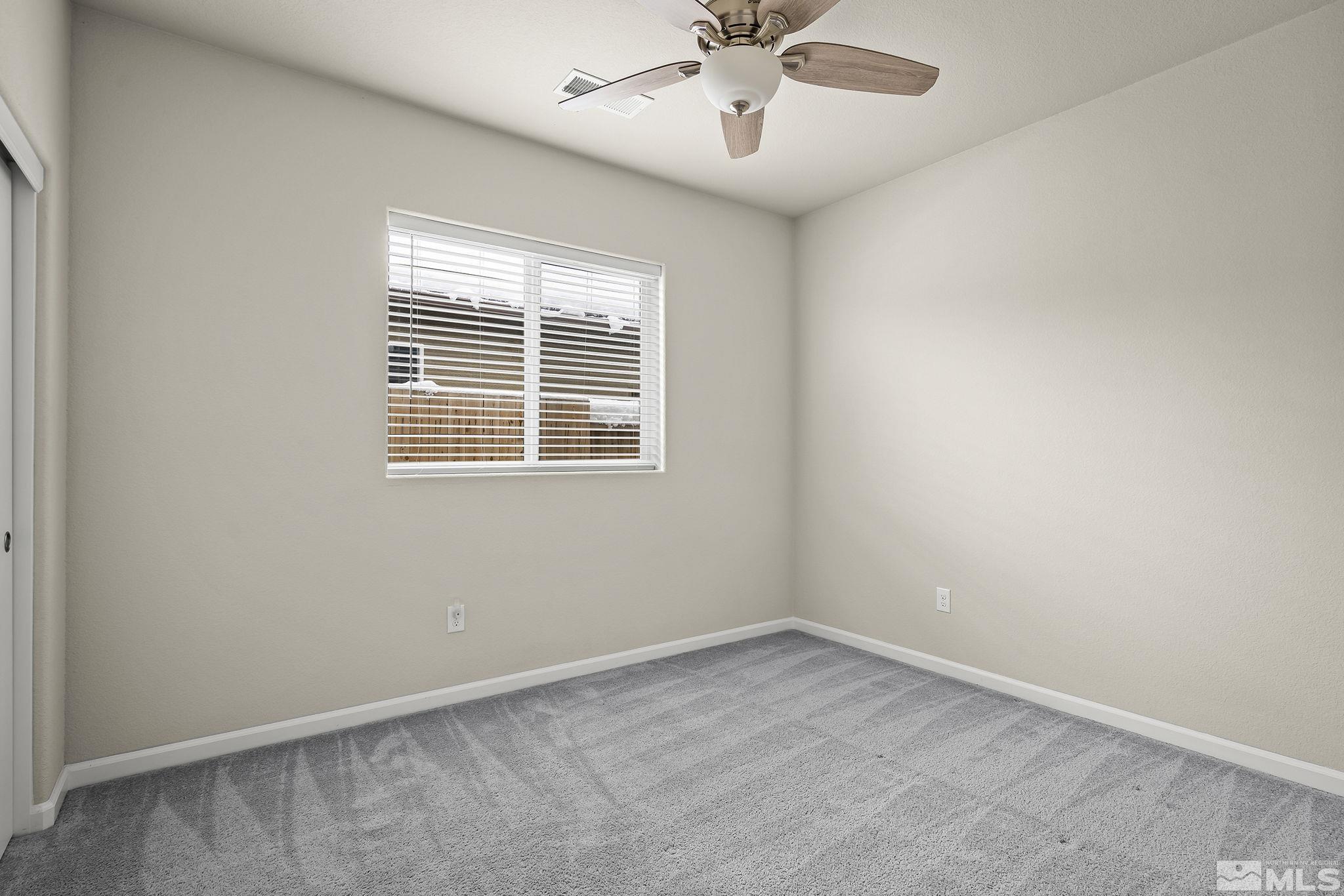 14420 Leiden Drive Reno, NV 89506 - Photo 11 of 16 an empty room with a window